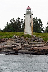 Franklin Island Light Tower Over Rocky Shore